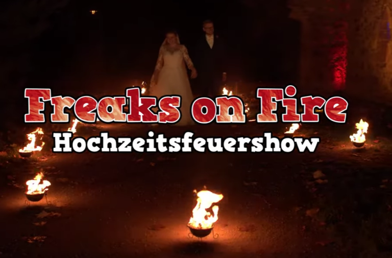 Hochzeitsfeuershow Hochzeitspaar zwischen Feuerschalen